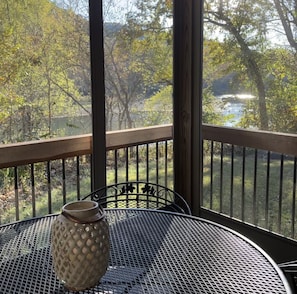 Spring and summer views are beautiful from screened porch and enclosed sunroom.