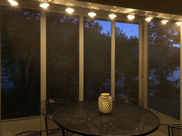 Screened in porch overlooking Lake Taneycomo.