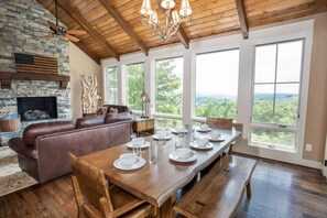 Open Concept Main Level with Hardwood Floors, Vaulted Tongue-and-Groove Ceilings, and Exposed Beams