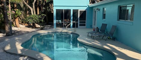 View of new backyard pool and back porch