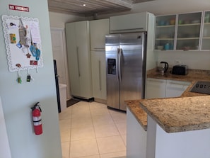 Large fridge freezer with water dispenser and ice maker