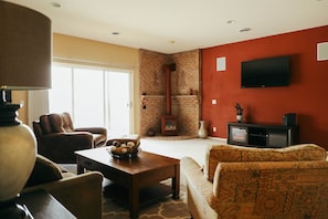 Spacious Living Room With Gas Stove