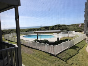 Pool and ocean view. Easily keep an eye on the pool with the ocean breeze.