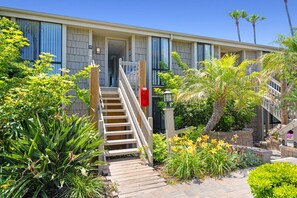 Tropical landscaping welcomes you to your beach escape