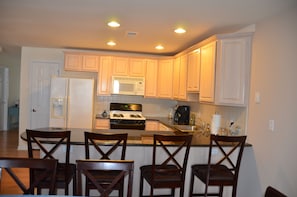 Kitchen with counter seating for 4
