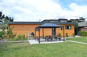 Outdoor eating area with natural gas BBQ.