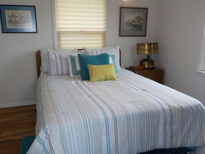 Cozy bed with clean linens.Enjoy the ocean views.  