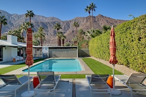 Lounge by the pool and enjoy the mountain views