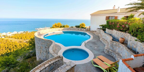 Relax by the private pool and soak in the ocean views