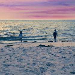 photo shared by our guest of their children enjoying the beach
