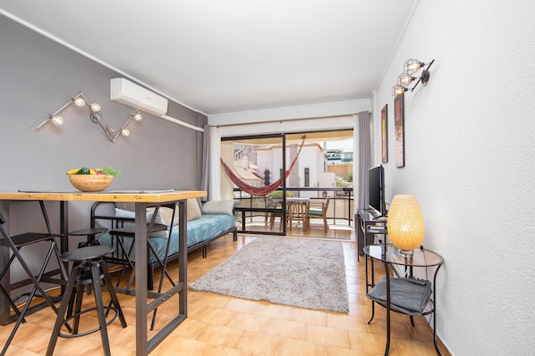 Living Room and Dining Area with Air Conditioning