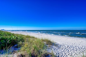 Private beach in front of building 