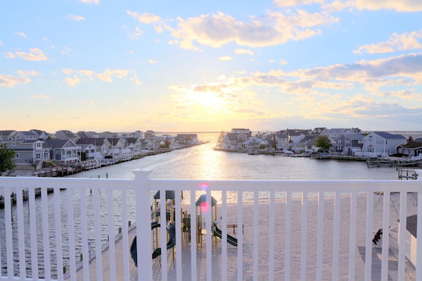 Amazing sunset views from the 3rd floor living room/loft w/ 1 sleeper + 1 sofa!