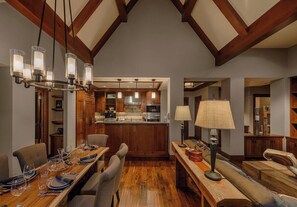 Dining area includes seating for six plus additional three seats at kitchen bar