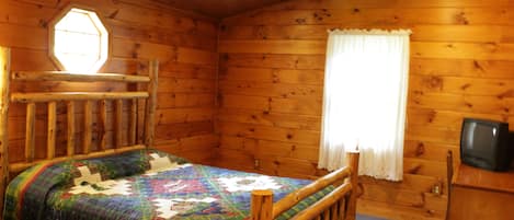 Large master bedroom with Queen hand-carved wood bed, big closet