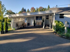 Carport with designated smoking area.