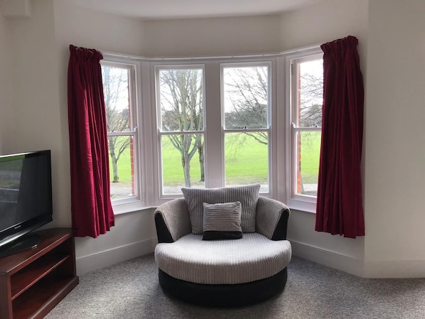 Living room overlooking the park opposite