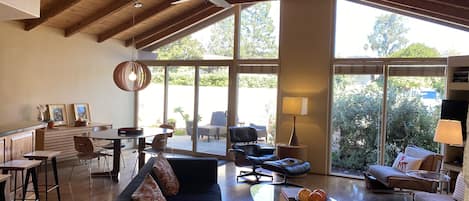 Open floor plan - living room, dining room and kitchen. High ceilings.
