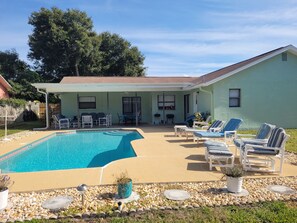 Pool deck with lounge chairs