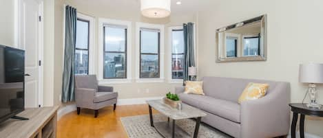 Light filled living room with view of Old North Church