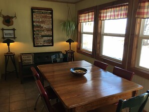Dining room/ seats 6 people. Faces east just 30' from Lake Wissota.