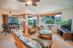 Living Room with Vaulted Ceilings opens to Large Lanai