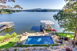 clear view of pool and lake from outdoor decks