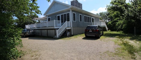 Circular driveway, showing large deck, small back deck, outdoor shower