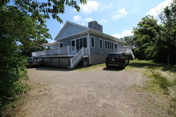 Circular driveway, showing large deck, small back deck, outdoor shower