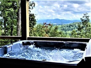 Covered hot tub on lower level deck 