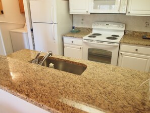Kitchen, laundry room to the left