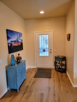 entry way showing new flooring and paint (December 21)