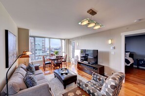Sun drenched south/west facing living room, with 2 separate patio spaces.