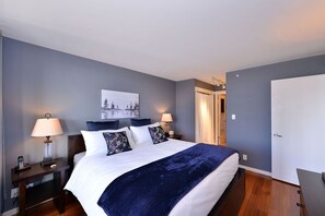 High Quality Linens, two side tables with lamps, 2 large wardrobe closets.