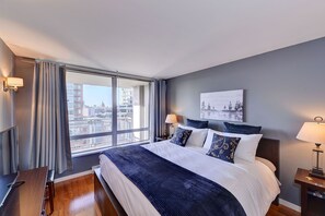 Large Master Bedroom, Black Out Drapes, King Size bed and 42 inch Smart TV. 