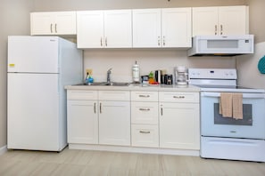 The fully equipped kitchen is designed for your culinary needs!