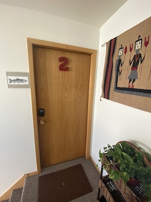 Using the front door, unit 2 is upstairs immediately on the left.
