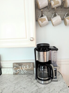 coffee station with handmade mugs
