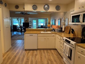 Kitchen, opens to living area