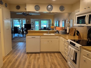 Kitchen, opens to living area