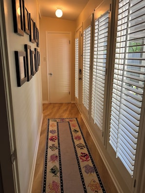 Hall from front door to primary suite