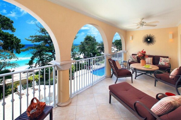 200 sq. ft. covered terrace overlooks the beach and 2 lagoon-style pools.