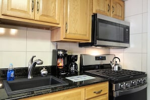 Well equipped kitchen with new stainless steel appliances