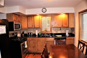 Modern Kitchen with Granite countertops and stainless appliances