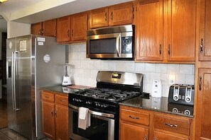 Stainless steel appliances, gas stove and over the range microwave