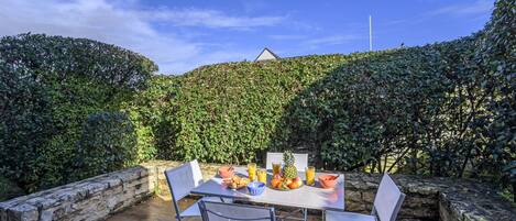 Sky, Table, Property, Furniture, Cloud, Plant, Chair, Outdoor Furniture, Natural Landscape, Outdoor Table