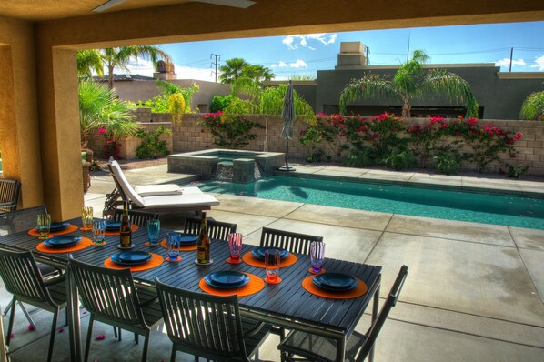 Outdoor dining by the pool. Life is good!