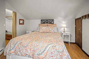 Bedroom, Queen bed. Walk-in closet to left and bathroom (not visible) to right.