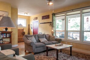 Beautiful, light filled space, tall ceilings and picture windows welcome you.