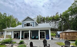 Front view of home, gardens, and gazebo. 